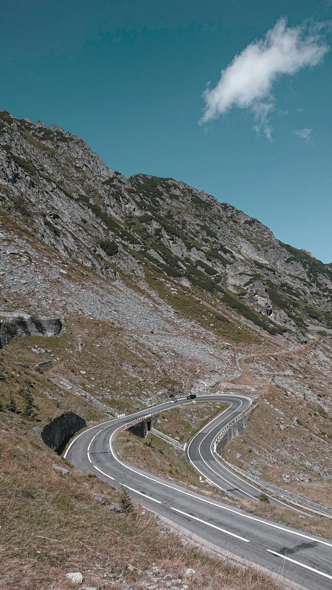The Transfăgărășan road winding through the Carpathian Mountains